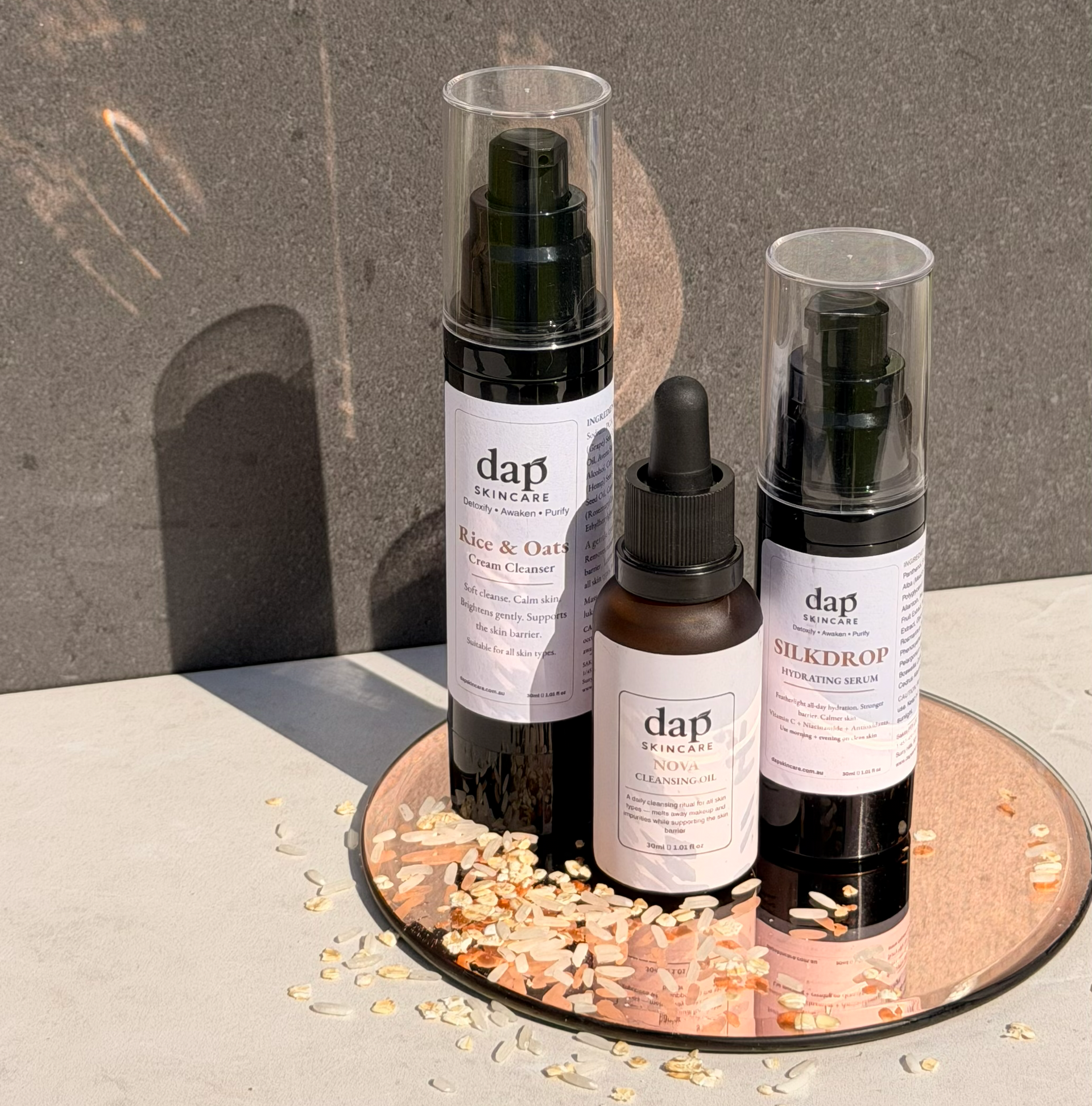 DAP Skincare minimalist routine — three products on a copper tray